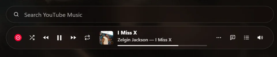 The search bar and the glass player bar with play, skip, shuffle, lyrics and queue.